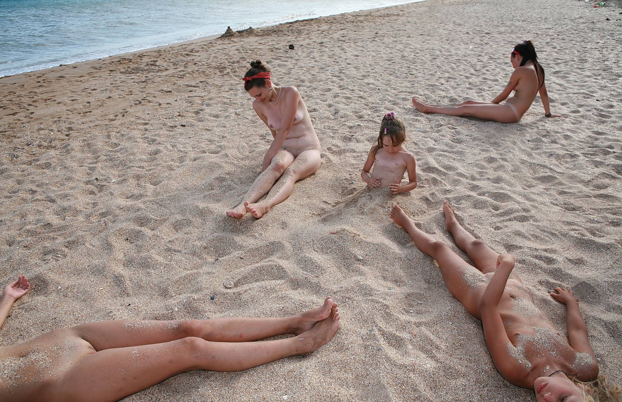 Pure Nudism Images-Enjoy Sand On The Back - 3
