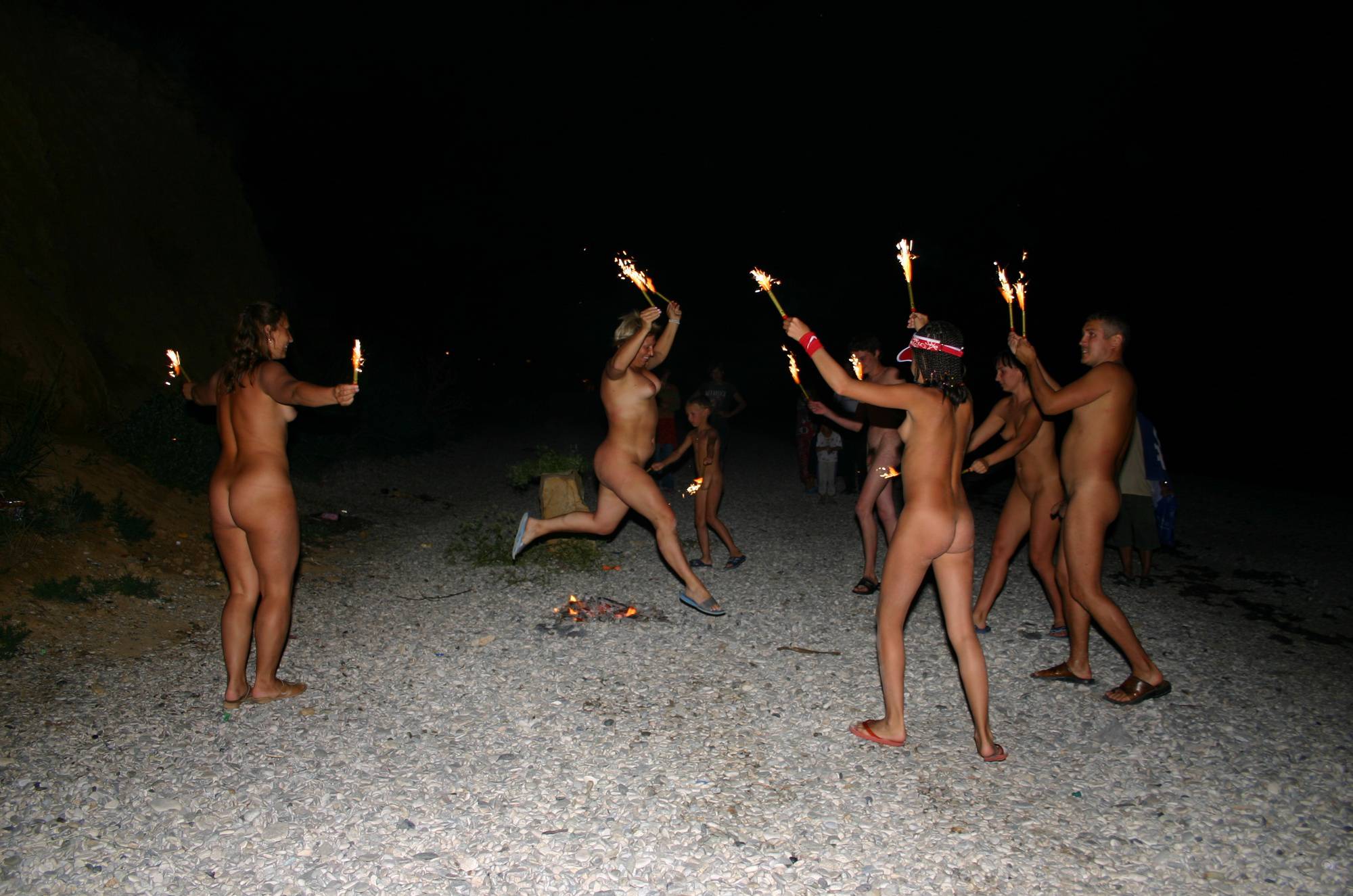 Pure Nudism Images-Fire and Bow Night Dancing - 2