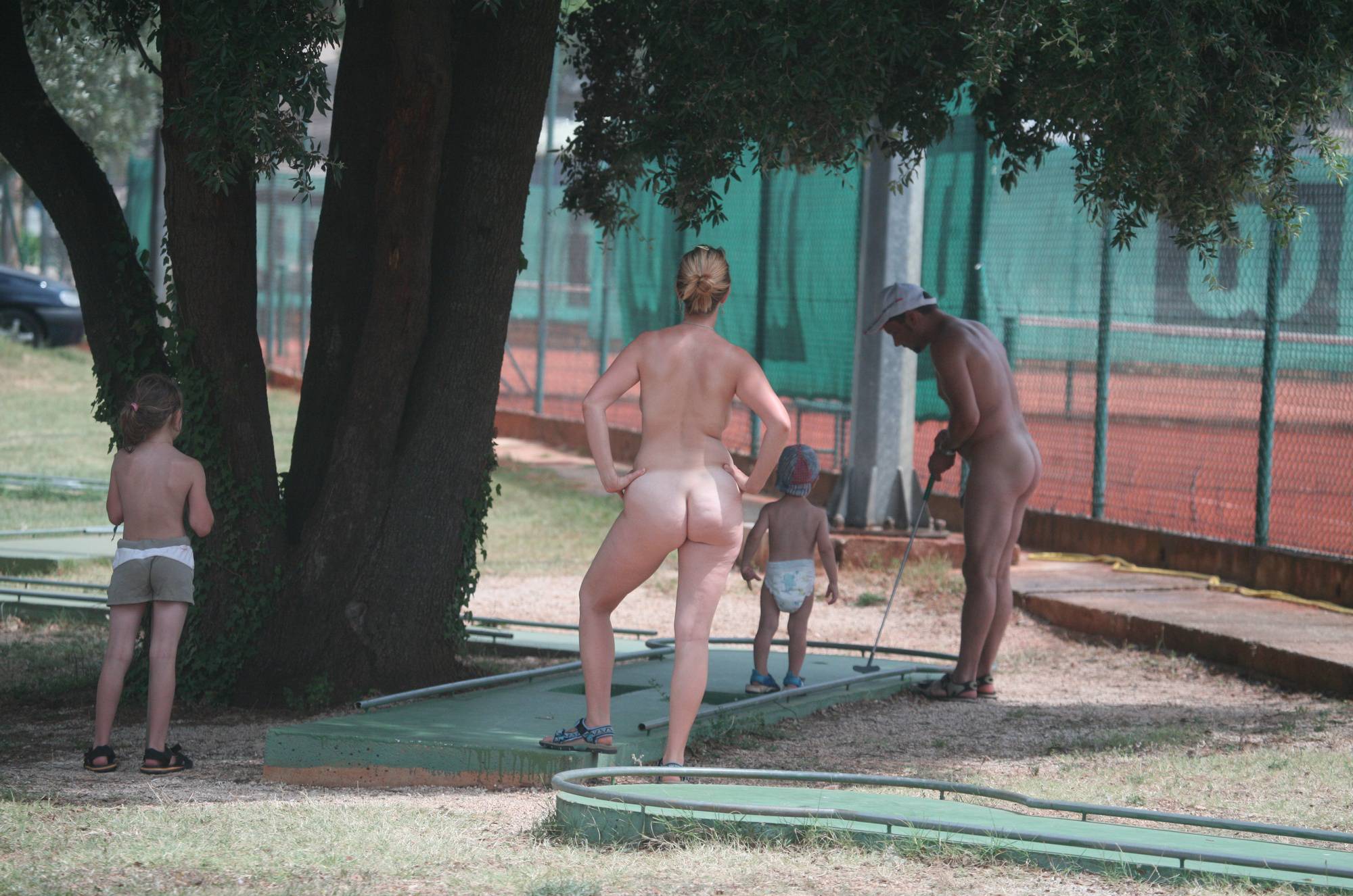 Pure Nudism Images-Nudist Family Mini-Golfing - 2