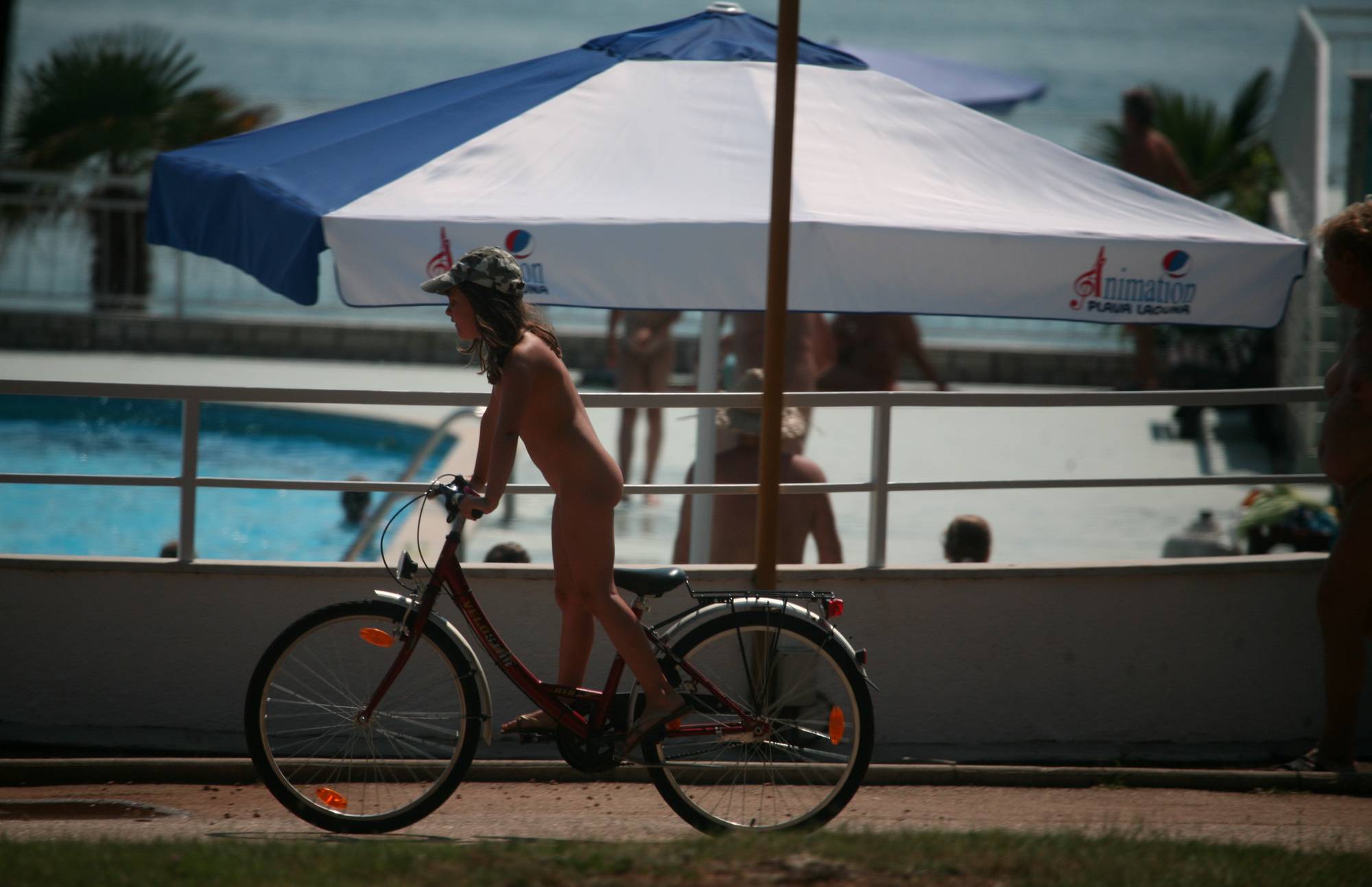 Poolside Nudist Bike Walk - 2
