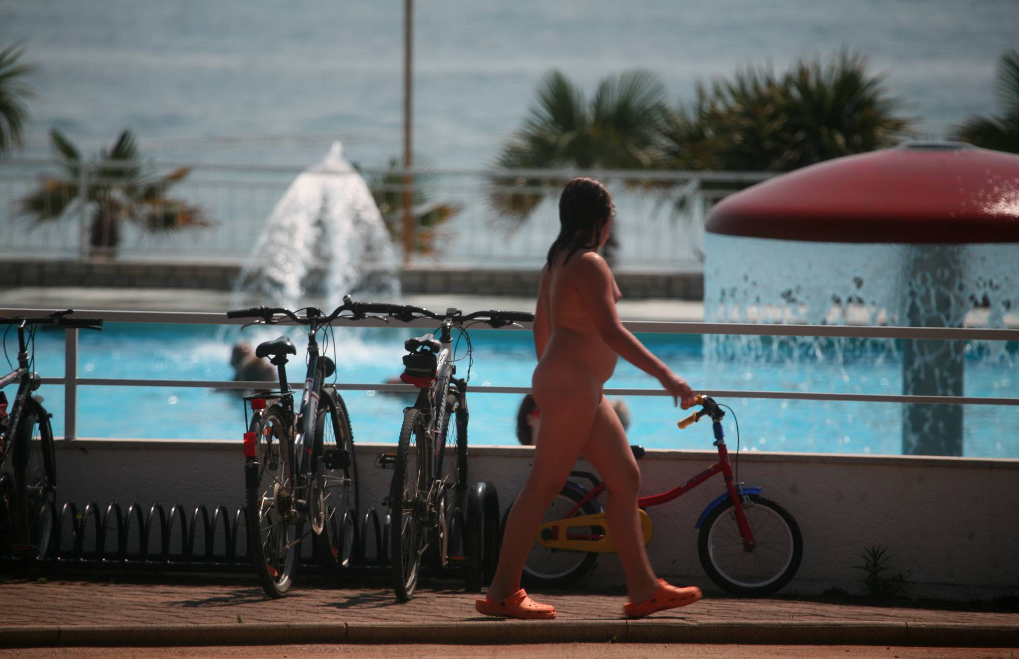 Poolside Nudist Bike Walk - 1