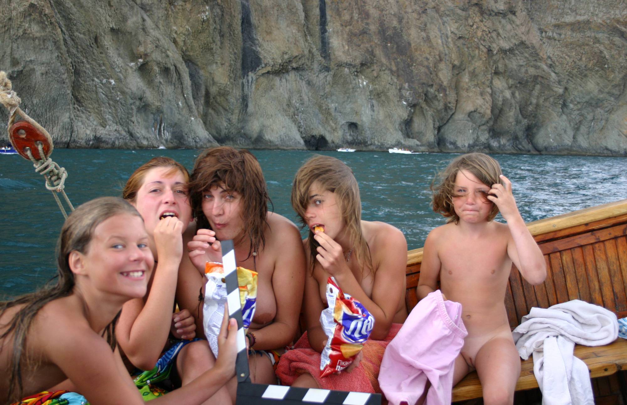 Purenudism Pics-Group Snacking on Boat - 1