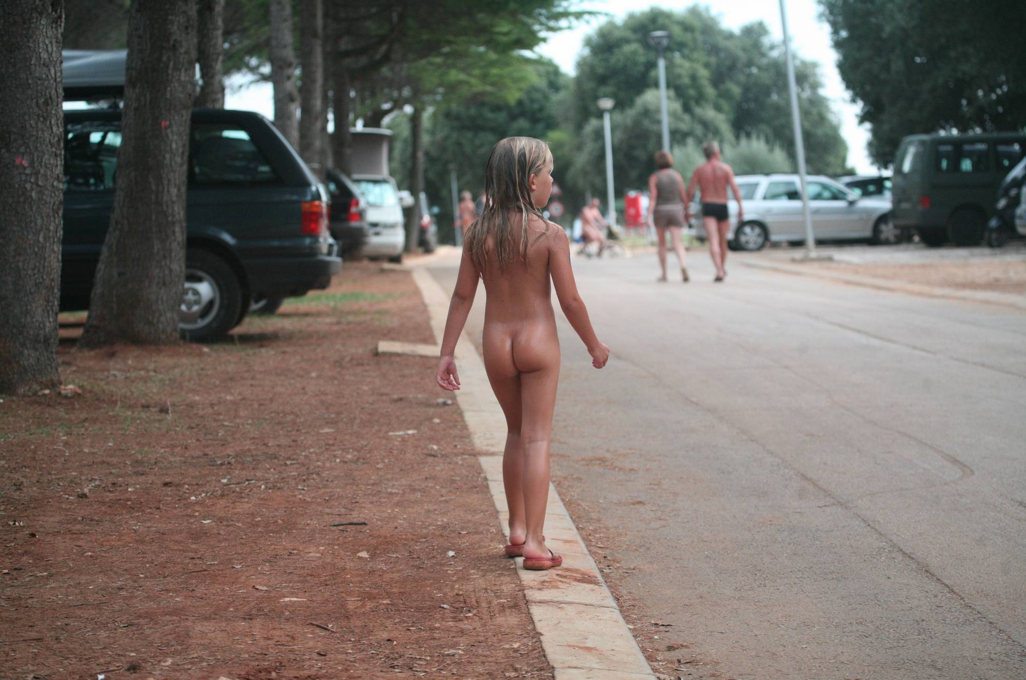 Pure Nudism-Naturist Child on Sidewalk - 2