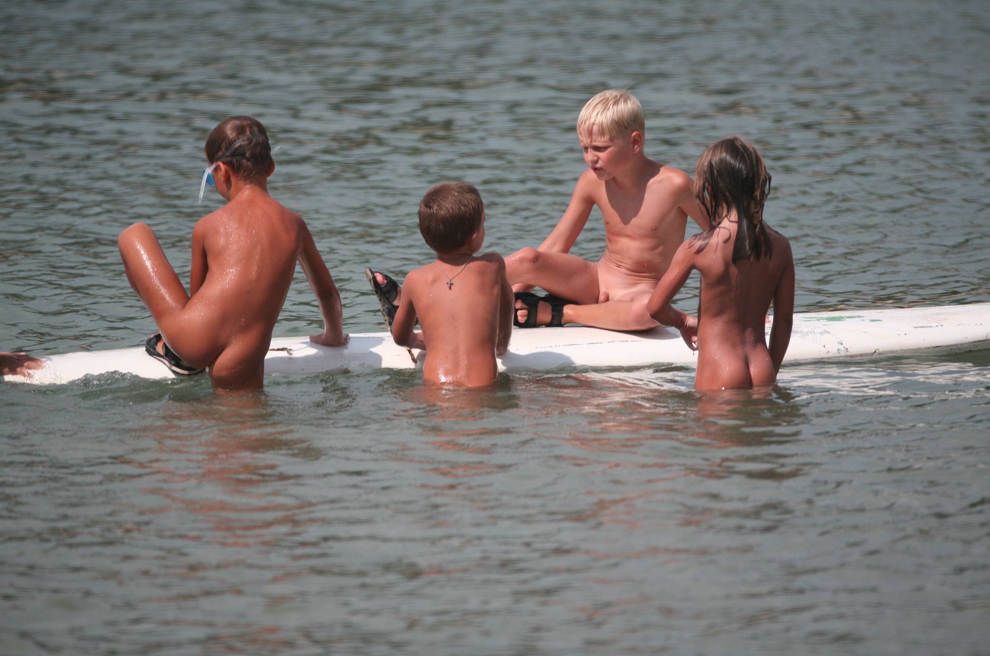 Several Kids On Surfboard - 3